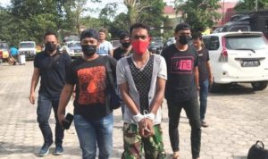 Terduga pelaku Perampok Sadis Jumartin saat digiring anggota Satreskrim Polres Tanjungpinang