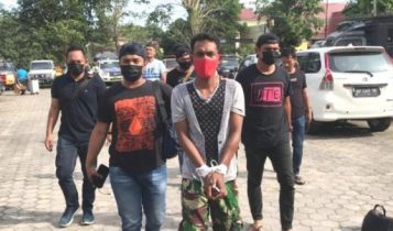 Terduga pelaku Perampok Sadis Jumartin saat digiring anggota Satreskrim Polres Tanjungpinang