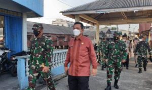 Gubernur Kepri Ansar Ahmad saat memulai aktivitas kerja setelah dinyatakan sembuh dari Covid berangkat ke Batam.