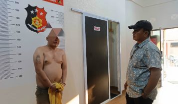 Kanit Jatanras Satreskrim Polresta Tanjungpinang Ipda Fredy Simanjuntak saat membawa pelaku ke Satreskrim Polresta Tanjungpinang. Foto Roland Kanit Jatanras Satreskrim Polresta Tanjungpinang, Ipda Fredy Simanjuntak saat membawa pelaku ke Satreskrim Polresta Tanjungpinang. (Foto: Roland)