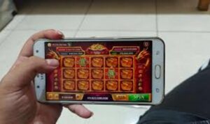 Ilustrasi Permainan Judi Online di Handphond
